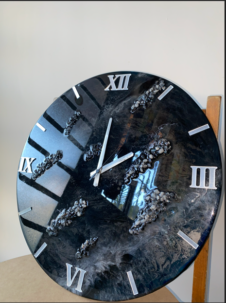 Reloj decorativo en resina