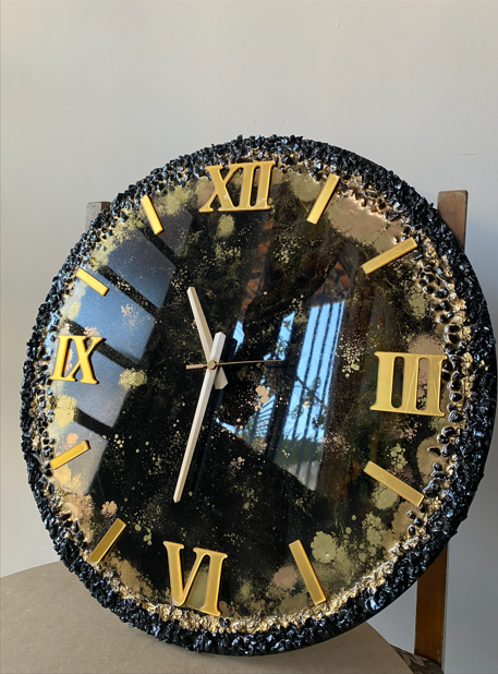 Reloj decorativo en resina